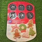 *new* Wilton 12 Christmas Shapes Cookie Baking Tray/tin/pan/sheet Non-stick. Fixed Price $11.88.