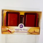 Wilton Mini Sweet Savory Pie Press 4 1/2" X 3" Homemade Hot Pocket. Fixed Price $7.99.