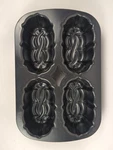 Nordicware Mini Bunt Loaf Pan Heavy Duty 14X9" Bakeware. Fixed Price $24.95.
