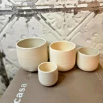 Safi Roost Stoneware Tall Cream - 4 Piece Set In Box. Fixed Price $50.00.