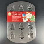 1868 Wilton 12 Cell Santa/snowman/tree/aluminum Cookie Baking Pan. Fixed Price $10.99.