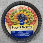 Wilton Perfect Results 9 Inch Round Non-stick Tart And Quiche Pan 2105-6818. Fixed Price $19.99.