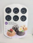 Wilton Mini Fluted Pan 12 Cavity 16.5"X11.25" 2105-0557- New Hostess W/mostest. Fixed Price $19.97.