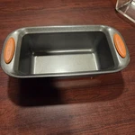 Rachael Ray Yum-o Bakeware Oven Lovin' Nonstick Loaf Pan 9" X 5" New Orange Grip. Fixed Price $14.63.