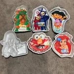 Lot Of 6 Wilton Character Cake Pans Tmnt Elmo Dora Ariel Teletubbies Bugs Bunny. Fixed Price $43.35.