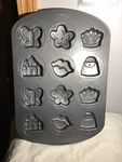 Wilton 12 Cookie Pan Princess Castle, Crown, Butterfly, Purse, Lips, Flowers-. Fixed Price $9.80.