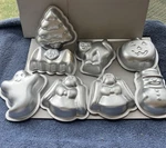 Lot Of 7 Vtg Wilton Mini Cake Pan Jello Mold Metal Holiday Baking. Fixed Price $20.00.