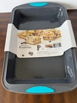 Trudeau Silicone 9X13 Cake Pan With Reinforced Metal Frame Gray - New. Fixed Price $18.99.