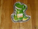 New Wilton Tyrannosaurus Rex Dinosaur Birthday Party Cake Pan Mold #2105-1022. Fixed Price $17.49.