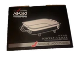 New Unopened All-clad Porcelain Square Baker, 2" With Trivet. Fixed Price $120.00.