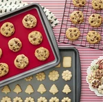 Wilton Silicone Baking Mat Non-stick, Heat Resistant Red, 10.25 X 16IN. Fixed Price $15.97.