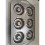 Nordic Ware Nonstick Donut Pan. Fixed Price $10.61.