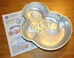 Wilton: Step By Ghost Cake Pan W/instructions #2105-1077 Guc 12"X9"X2". Fixed Price $6.49.