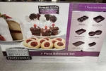 Chicago Metallic Seven Piece Professional Bakeware Set W/ Armour Glide Non Stick. Fixed Price $34.99.