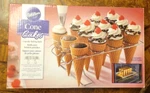 Wilton 12-CAVITY Steel Cone Cakes Cupcake Baking Rack. Fixed Price $12.99.