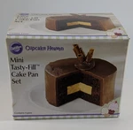 Wilton Tasty-fill Mini Cake Pan Set & Recipe Booklet 4 Pc. Fixed Price $14.99.