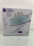 Tilt Ultra Turntable From Wilton 121. Fixed Price $60.00.