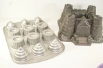 Lot Of 2 Nordic Ware Pans, Castle Bundt And Filled Cupcake. Fixed Price $20.00.