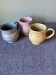 Temp-tations Light Pink,grey & Yellow With Stripe Bands 16 Oz Coffee Mug By Tara. Fixed Price $20.98.