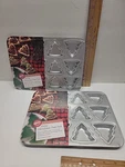 New Wilton 2105-8463 Petite Christmas Tree Pan, Pans 24 Molds. Fixed Price $16.00.