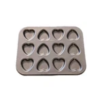 Wilton Petite Pans Makes 12 Candy Hearts In #2105-2432 1992. Fixed Price $12.00.