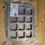 Pampered Chef Pan 1544. Holds 12 Brownies. Non Stick Heavy Duty New. Fixed Price $25.00.