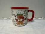 Temptations By Tara Gingerbread Baker Ceramic Christmas Mug Red Interior. Fixed Price $19.00.