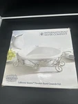 International Silver Steel Rack, With 11-INCH Round Porcelain Casserole Dish. Fixed Price $17.50.