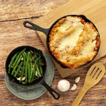 Vintage Epoca Country Living Cast Iron Pan Set. Fixed Price $50.00.