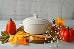 Wild Eye Designs, Ceramic Brie Baker With Lid, Cream Color. Fixed Price $40.00.