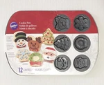 Wilton Christmas Cookie Sheet Baking Pan Shapes Molds Non Stick 6 Holiday Design. Fixed Price $14.99.