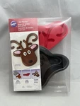 Wilton Reindeer Cake Pan Set With Candy Mold 2105-5787 Piece Bakeware. Fixed Price $15.98.