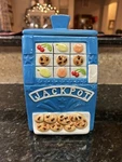Blue Slot Machine Cookie Jar From Kitchen Worthy. Fixed Price $24.95.