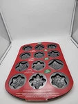 New Wilton Holiday Cookie Shapes Non Stick Baking Pan 12 Cavities 6 Designs. Fixed Price $9.99.