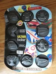 Wilton 12 Cavity Cookie Pan Sports Cars Planes Shirts Trophies. Fixed Price $12.00.