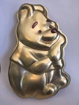 Vintage Wilton Walt Disney Winnie The Pooh Cake Pan Gold Tone 515-401. Fixed Price $10.00.