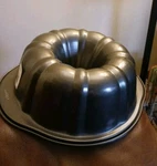 Wilton Perfect Results Premium Non-stick 9.5 X 3.4 Fluted Tube Ring Cake Pan. Fixed Price $21.95.