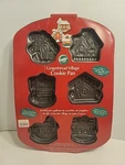 Christmas Wilton Gingerbread Village Non-sitck Cookie Pan Mold Recipes 2105-8147. Fixed Price $13.00.