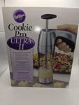 Wilton Cookie Pro Ultra Ii Press Set 16 Disks Silver Black Easy Grip New. Fixed Price $37.00.