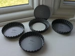 Wilton Perfect Tart Quiche Pans Pushout Bottom 4"X.75" Round Scalloped Edge. Fixed Price $12.95.