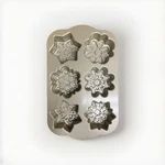 Nordic Ware New Frozen Snowflake Cakelet Pan 3 Cup Capacity 6 Unique Designs. Fixed Price $29.95.