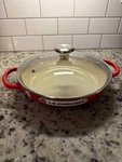 Creuset Sign Enameled Cast Iron 2.25QT Round Braiser With Glass Lid In Cerise. Fixed Price $180.00.