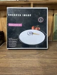New Sharper Image Pizza Set Includes 13" Stone, Cutter & Stand. Fixed Price $14.99.