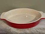 Creuset Red Enameled Stoneware Oval Casserole Baking Dish 10-22. Fixed Price $12.95.