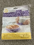 Wilton Bake-even Cake Strips For Pans 6-PIECE New. Fixed Price $25.00.