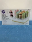 Wilton Treat Pops Display Set 12 Containers. Fixed Price $10.99.