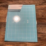 We Memory Craft Surface Silicone Mat 8.5X11. Fixed Price $7.80.
