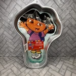 Wilton Dora The Explorer Cake Pan 2105-6300 2003 Aluminum W/ Insert. Fixed Price $19.98.