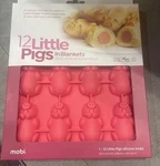 Silicone Baking Mold 12 Little Pigs Blanket Pink Mobi New. Fixed Price $10.00.