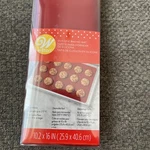 Wilton Non-stick Red Silicone Baking Mat, 10.2 X 16, 2105-0-0744. Fixed Price $11.00.